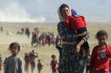 伊拉克雅兹迪妇孺在逃命路上【组图】