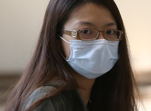 韩国中东呼吸综合征感染者增至7人 民众戴口罩防疫