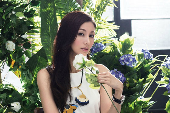 李嘉欣晒滑雪照似证未孕 网友指是圣诞旧照(图)