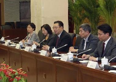 周锡生会见台湾客人