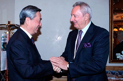 新华社社长李从军会见俄塔社社长伊格纳坚科