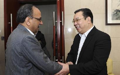 周锡生会见印度报业托拉斯总编