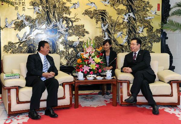 周锡生会见马来西亚驻华大使