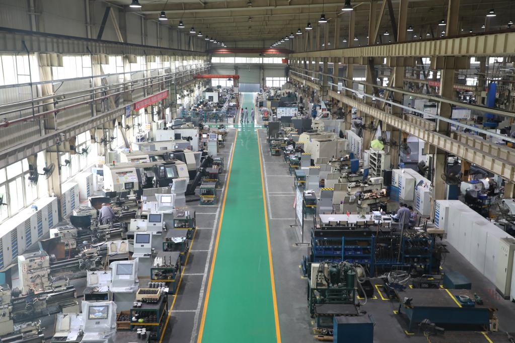 区的重庆水泵厂有限责任公司,洁净敞亮的数字化车间里一派繁忙景象