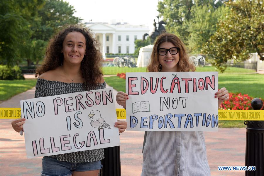 people attend a rally protesting against u.s.