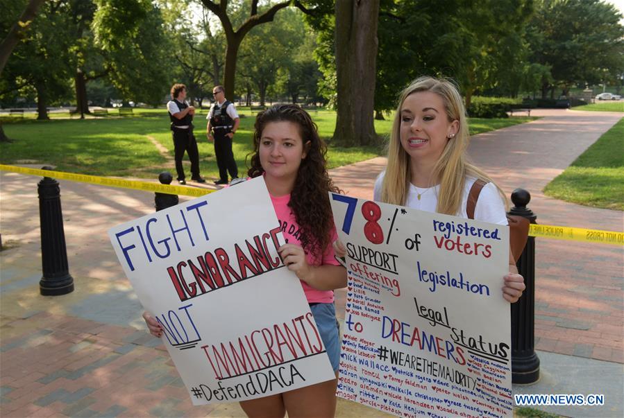 people attend a rally protesting against u.s.