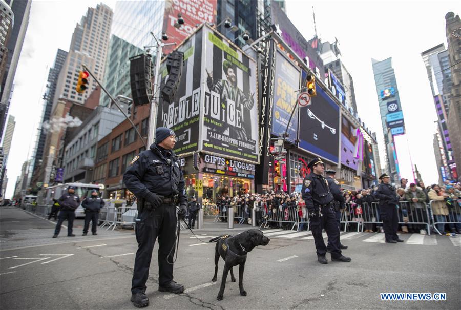 Local police officers stand guard for security before New Year ...