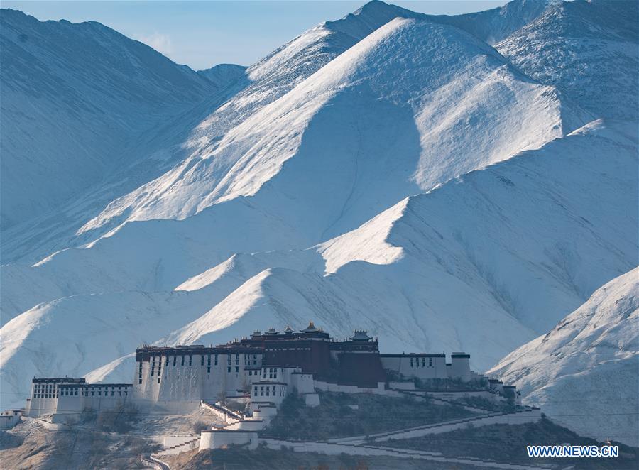 in pics: snowy weather in tibet, china