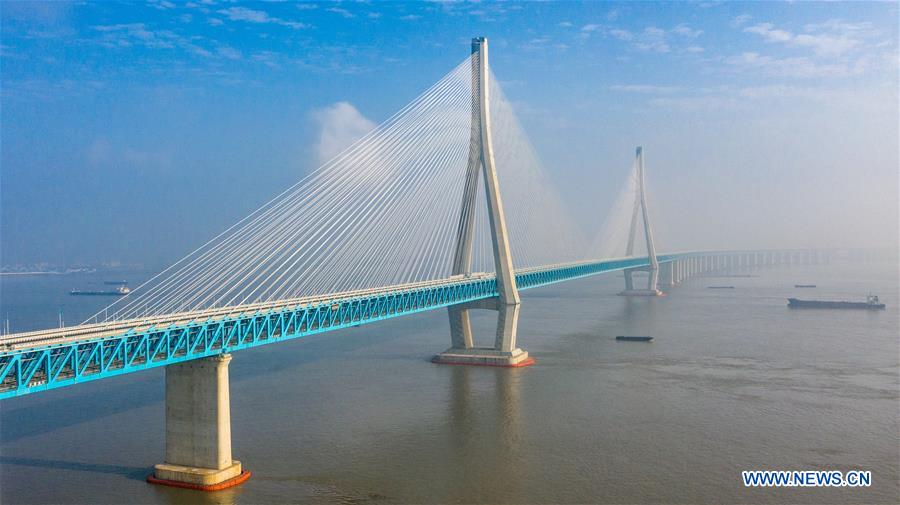 bridge linking nantong and zhangjiagang opens to t
