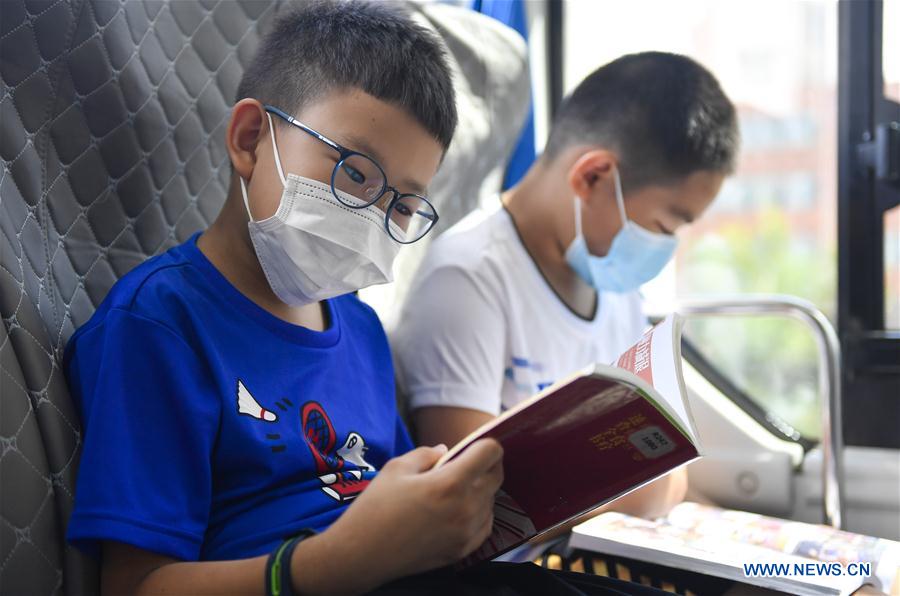 changchun library converts bus into mobile library