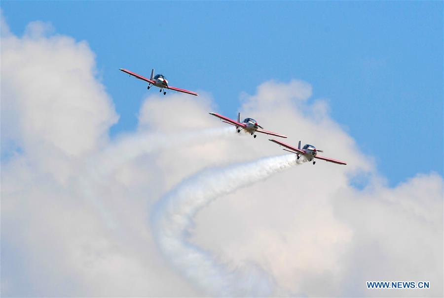 planes fly in formation during an aerobatics show in siziwang