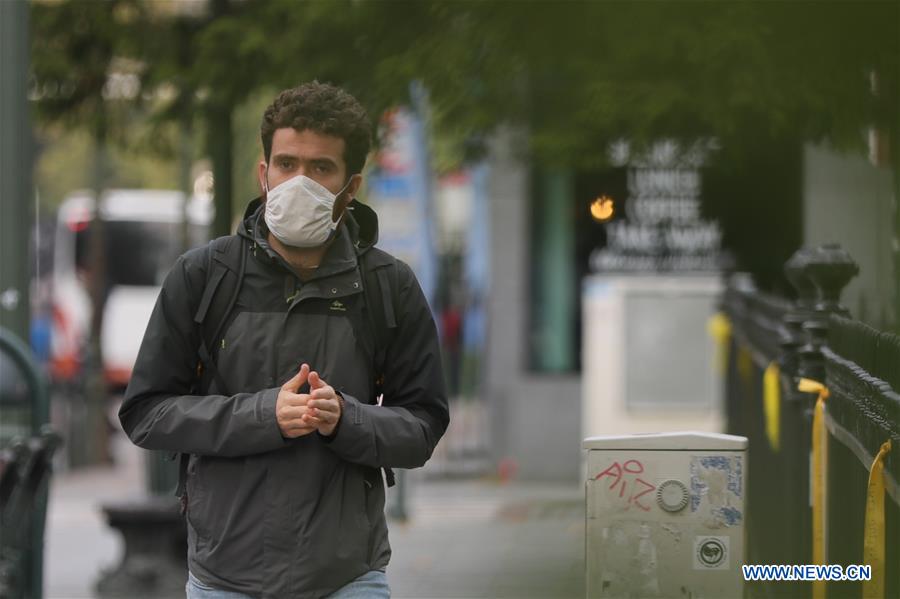 people wear masks in brussels, belgium