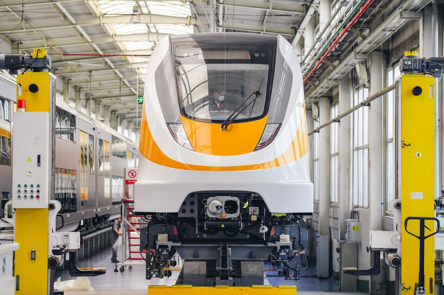 a staff member tests a middle-to-low-speed maglev train at crrc