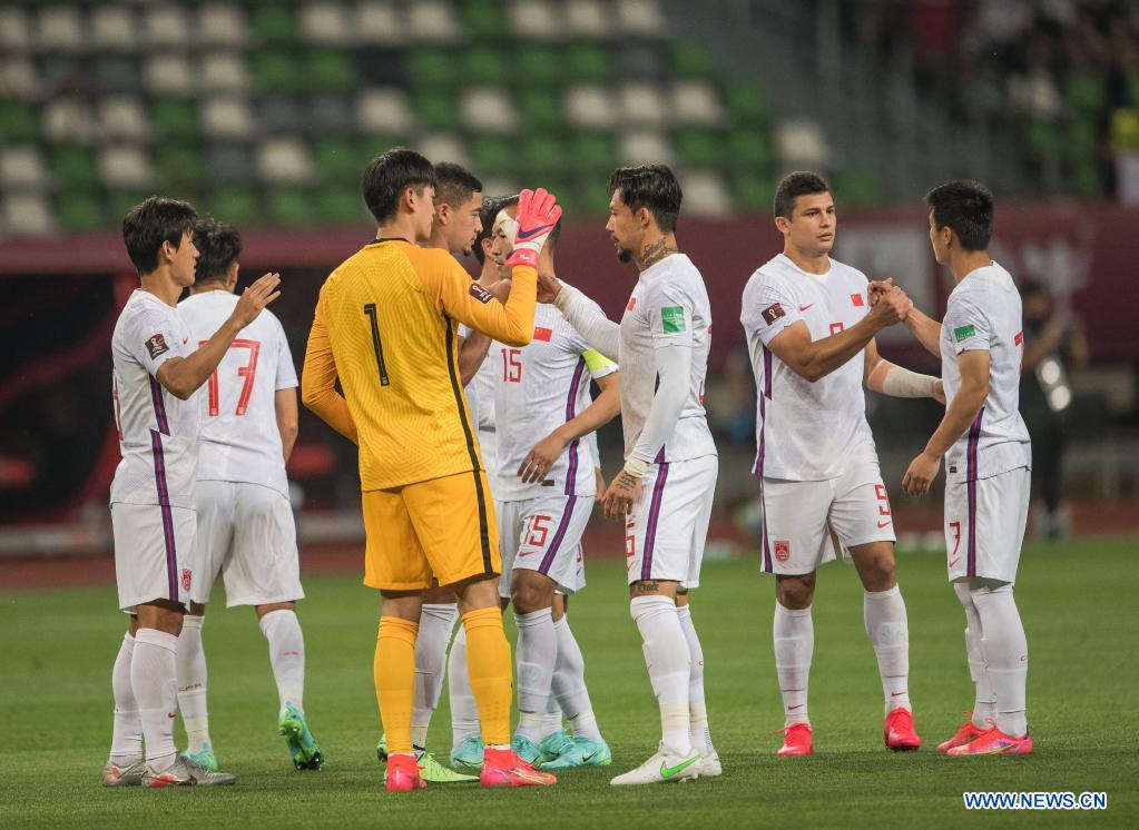 china leads guam 2-0 in world cup asian qualifier