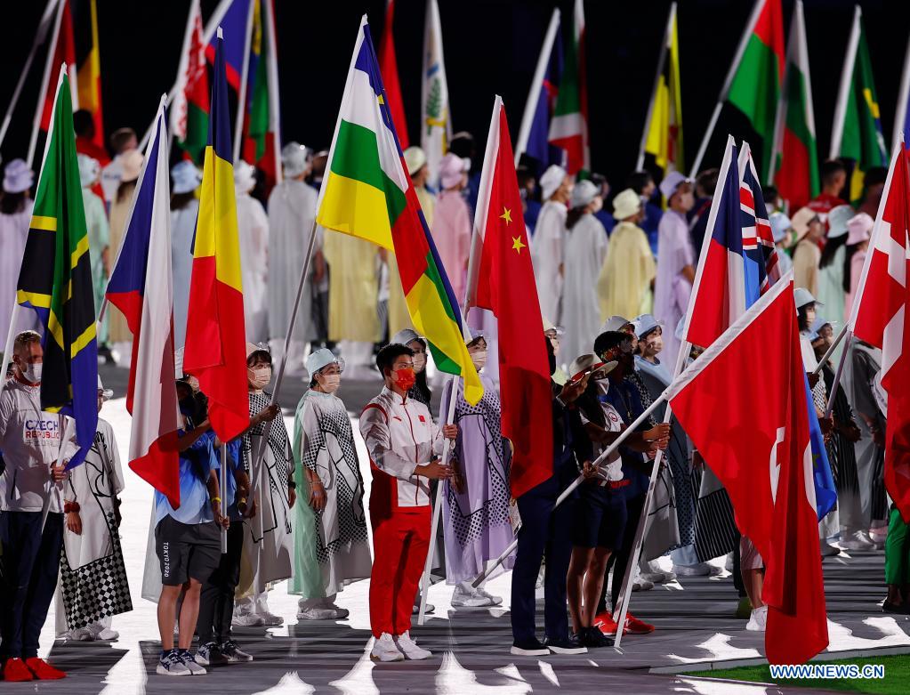 flag bearers enters the olympic stadium during the closing