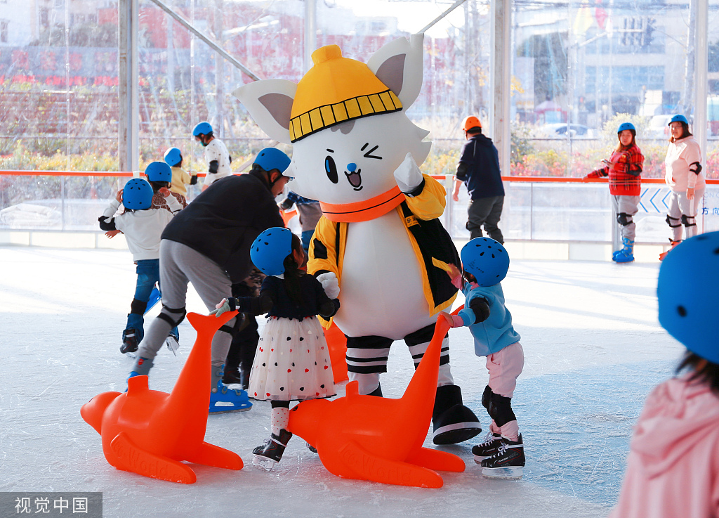 visitors enjoy ice skating at outdoor ice rink in shanghai