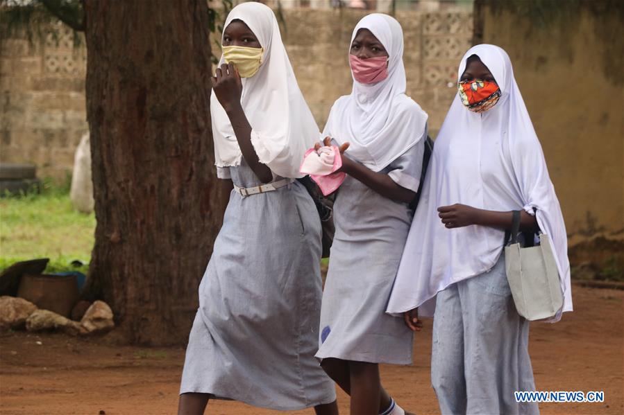 people wear face masks at school in town of iseyin, nigeria