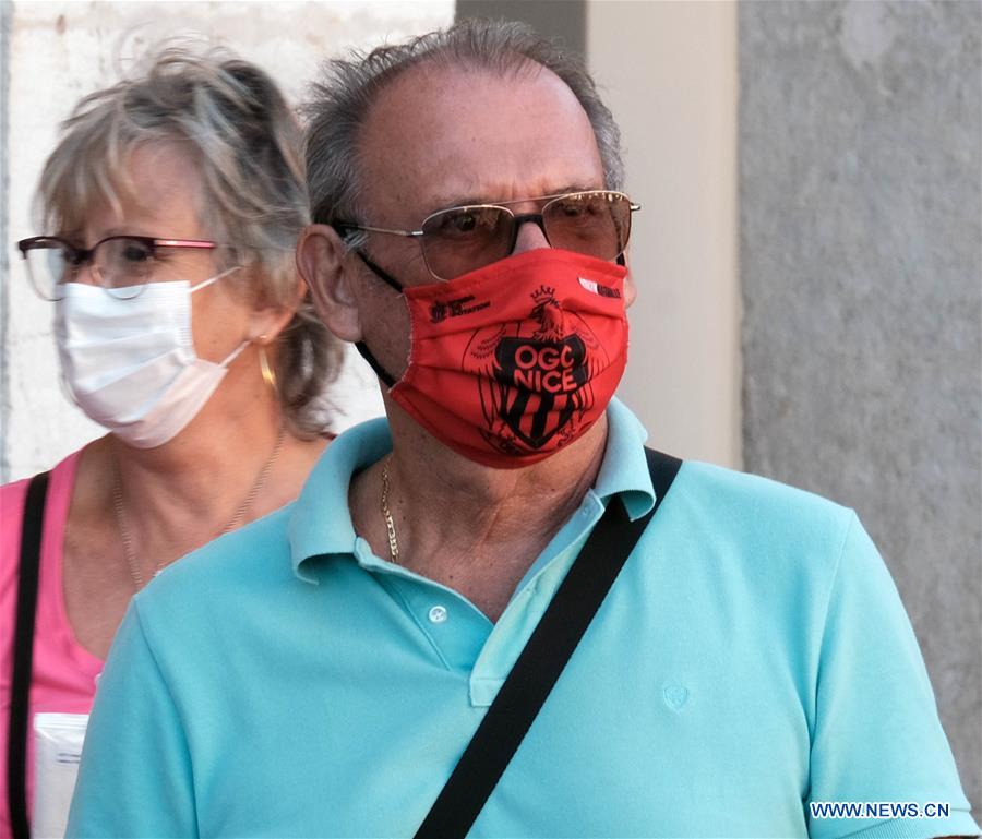 people wear face masks in france - xinhua | english.news.cn