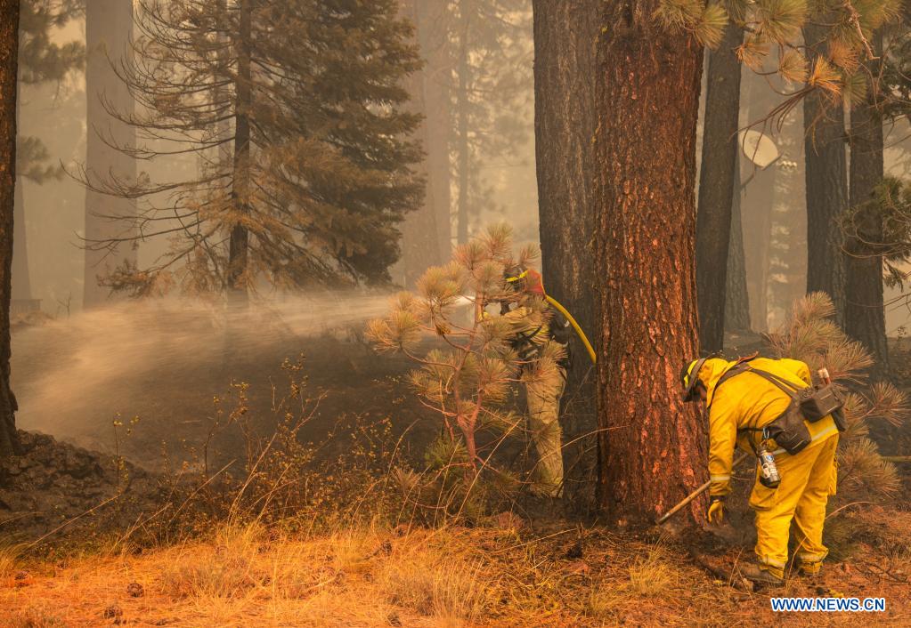 against a wildfire dubbed dixie fire in lassen national forest