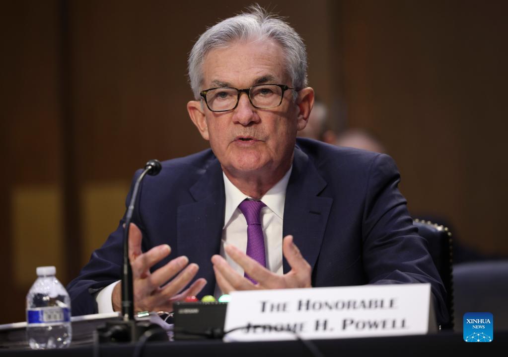 federal reserve chairman jerome powell testifies at a hearing
