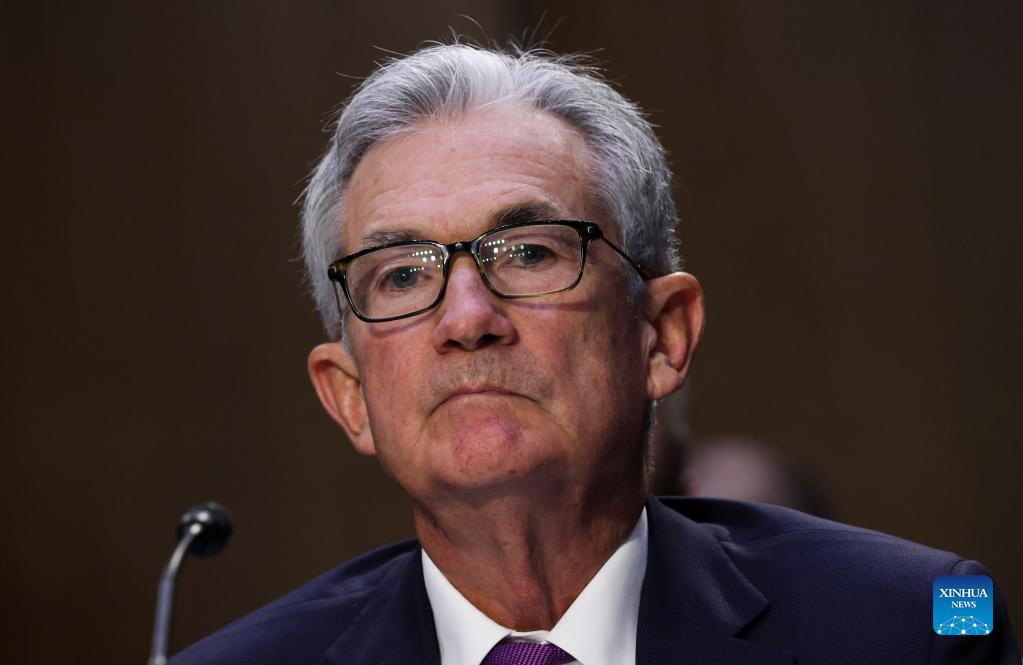 federal reserve chairman jerome powell testifies at a hearing