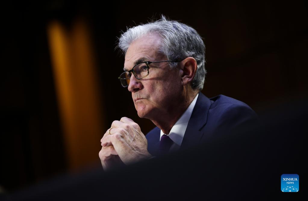 federal reserve chairman jerome powell testifies at a hearing