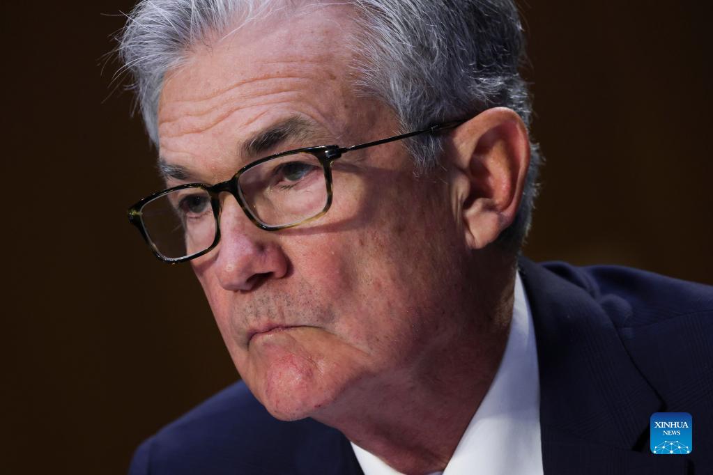 federal reserve chairman jerome powell testifies at a hearing