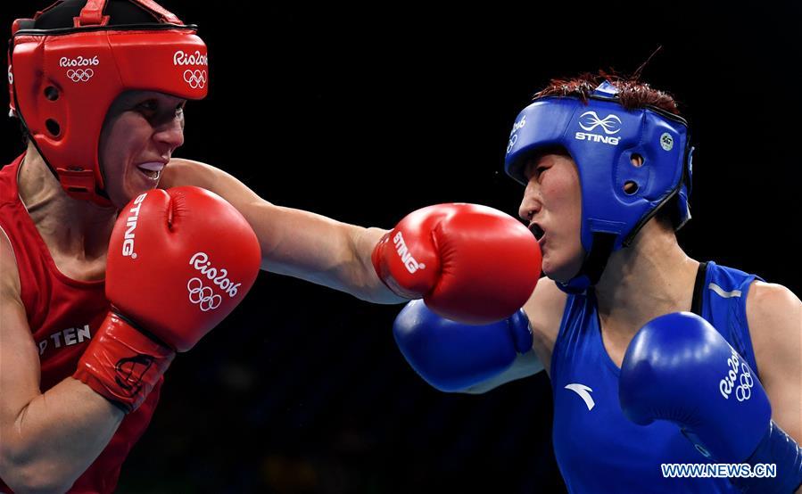 chinas yin junhua wins at womens light(57-60kg) boxing semi