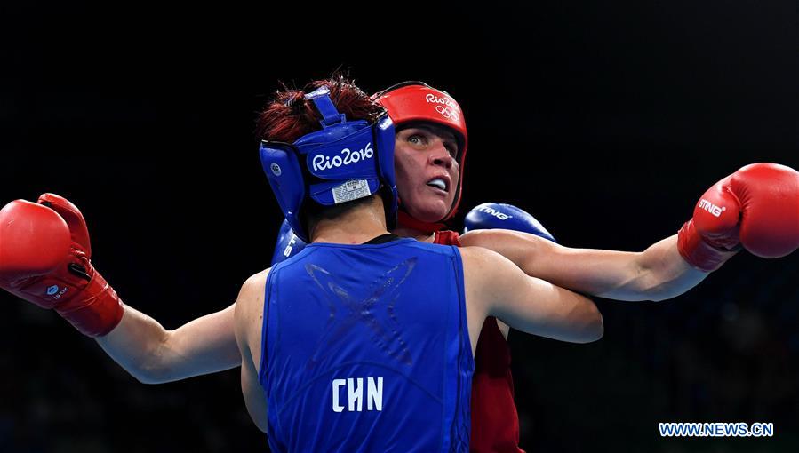 chinas yin junhua wins at womens light(57-60kg) boxing semi
