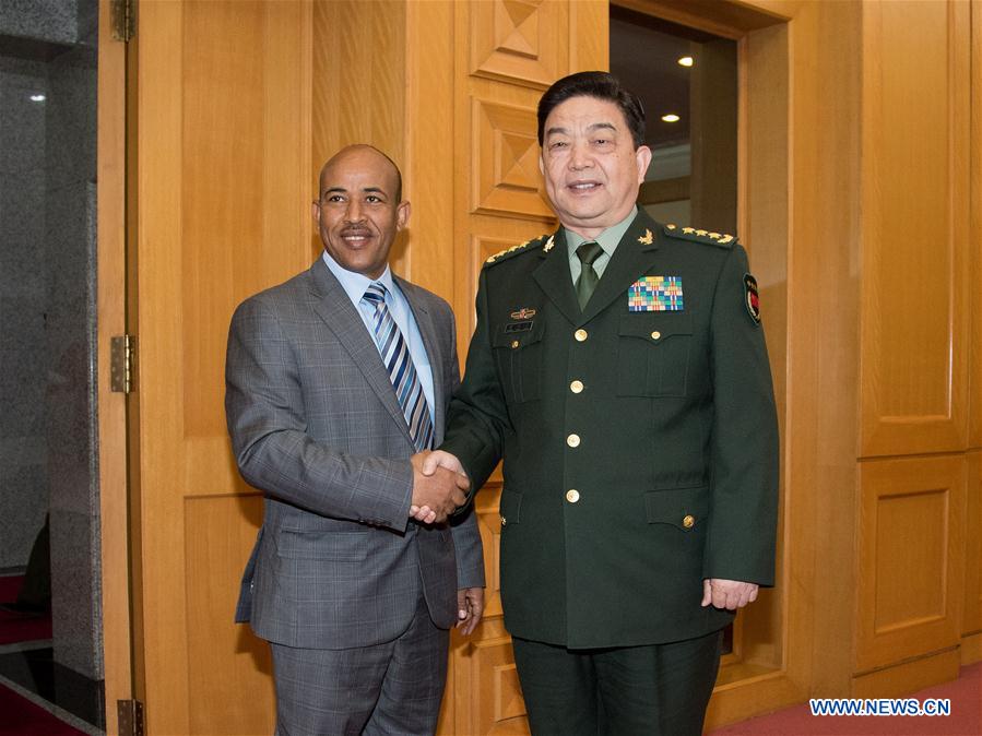 chinese state councilor and defense minister chang wanquan (r)
