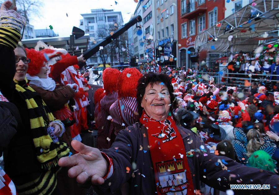 revellerstakepartinstreetcarnivalincolognegermany