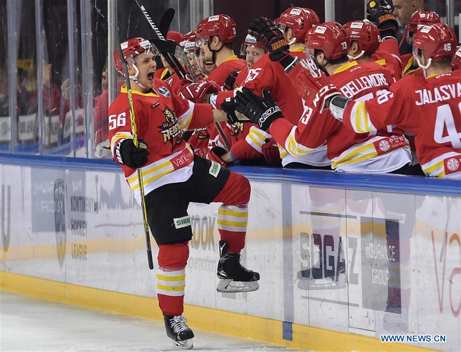 tommi taimi (1st l) of kunlun red star celebrates scoring with