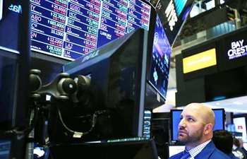 U.S. stocks close lower amid earnings, data
