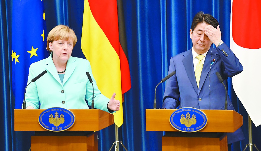 默克尔劝安倍"正视历史" 日本政客尴尬不搭茬