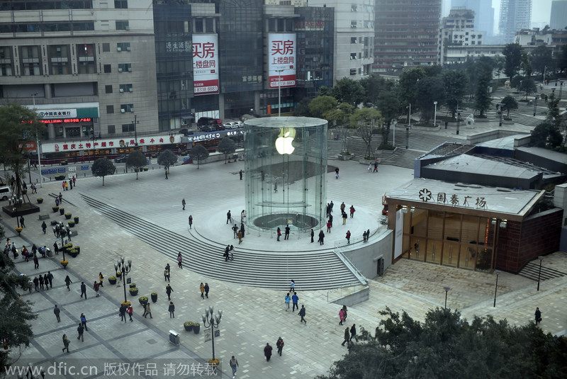 重庆圆柱形applestore零售店最后调试苹果悬空成解放碑新地标