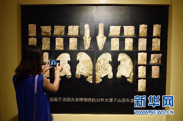 （文化）（1）法国归还我国的32件秦人文物在兰州正式移交