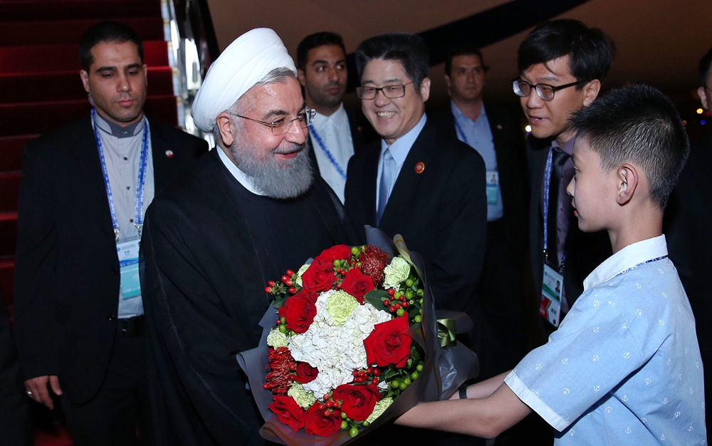伊朗总统鲁哈尼抵达青岛