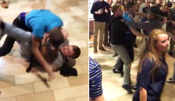 美&ldquo;黑色星期五&rdquo;男子打架引民众围观（组图）